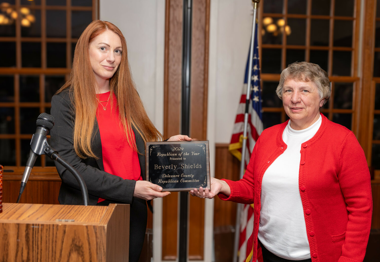 Delaware County Republican Committee Chairperson Katie Taggart, left, presents Beverly Shields with the 2024 Republican of the Year award.